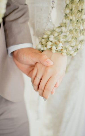 midsection-bride-holding-bouquet-scaled.jpg