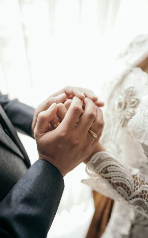 midsection-couple-holding-hands-scaled.jpg
